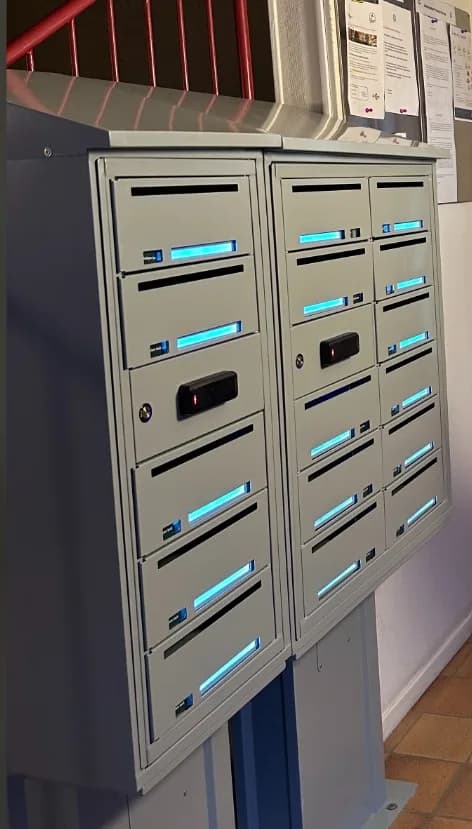 Illuminated connected mailbox cabinet